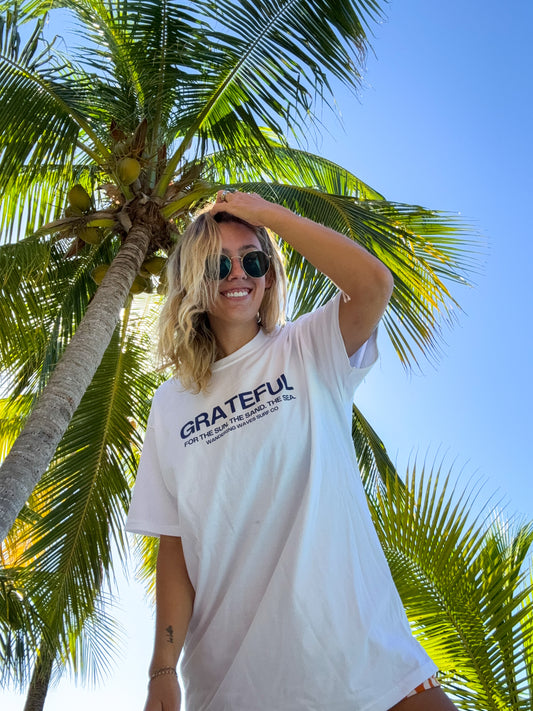 Grateful Tee made from 100% organic cotton. Grateful for the sun, the sand, the sea