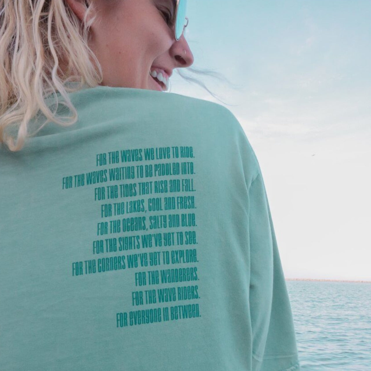 "Surf Club Mantra Tee" by Wandering Waves Surf Company designed by Amanda Vick of Moon and Wolf Co.