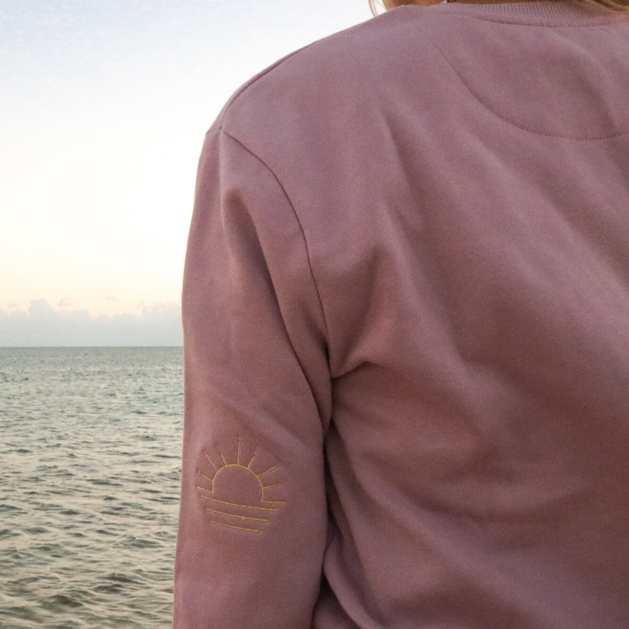 Sunrise, Sunset embroidered detail on back of Sunny State of Mind crewneck sweatshirt by Wandering Waves Surf Company