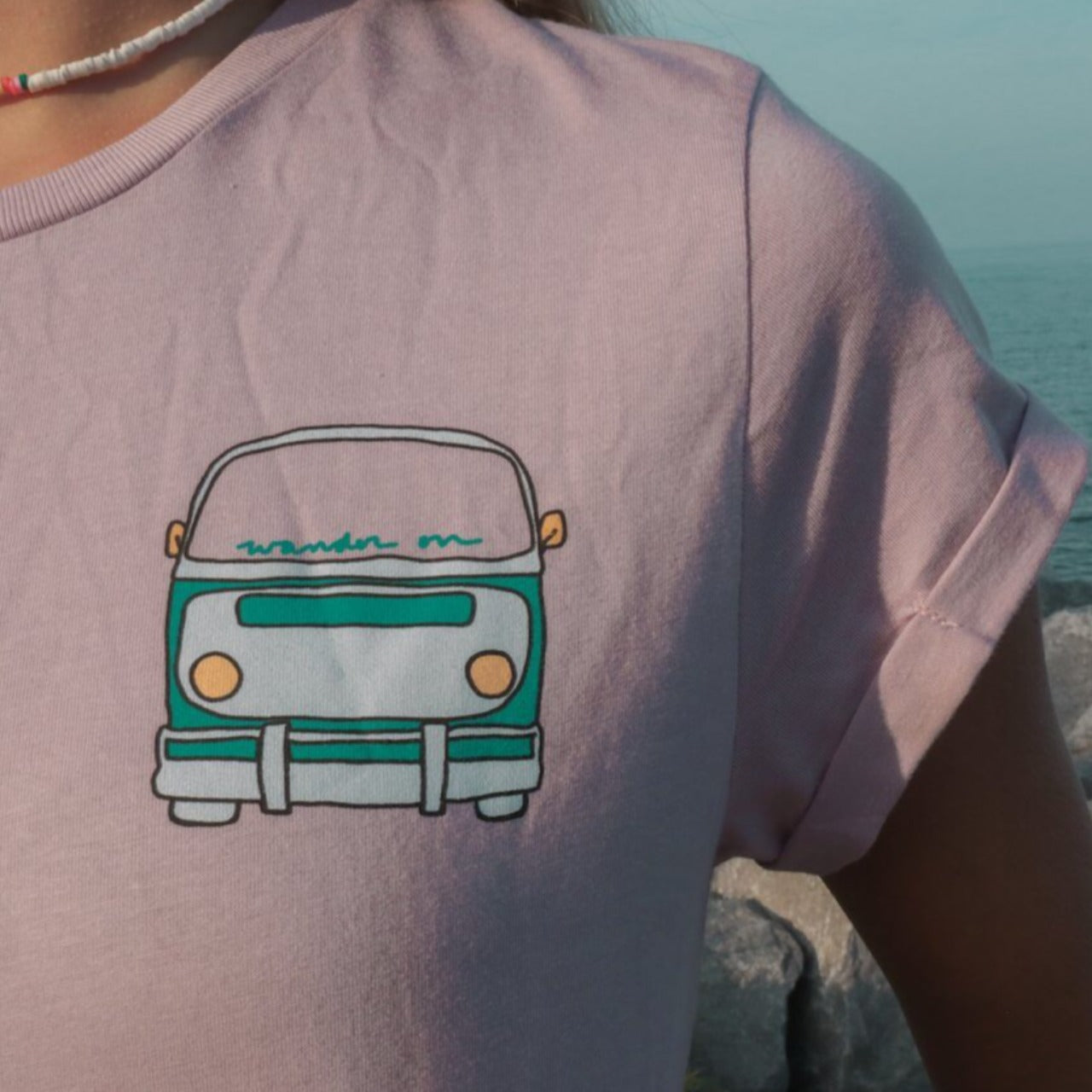 "Surf Van Rolled Sleeve Tee" featuring Wander On text. A ladies tshirt inspired by our favorite surf van, the VW bus!
