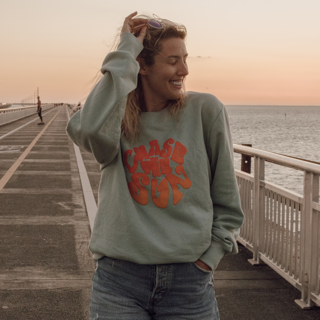 Chase The Sun crewneck sweatshirt in the color sea mist from Wandering Waves Surf Company. Made from sustainable materials and 100% organic cotton
