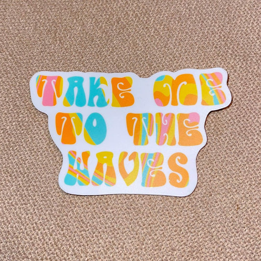 "Take me to the waves" die cut sticker with bright, groovy font.